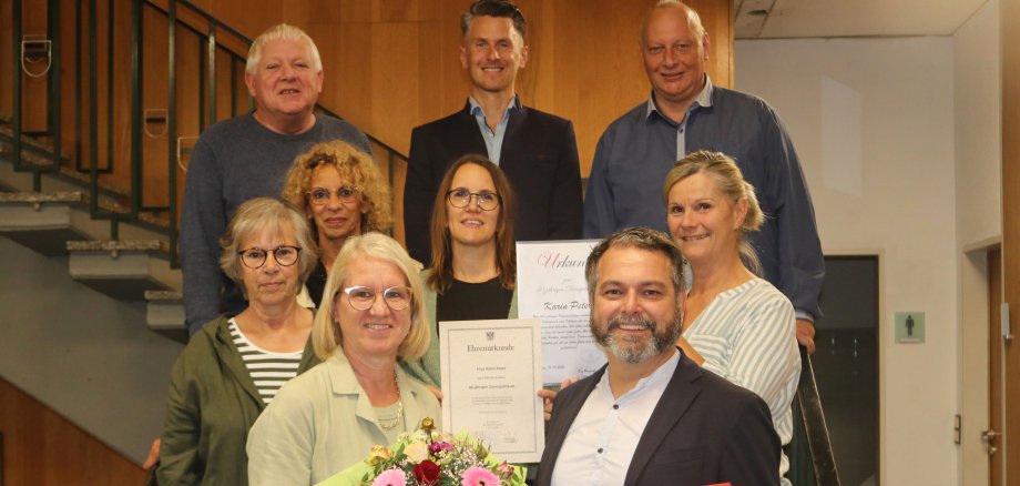 Karin Peter mit Kollegen und dem Bürgermeister